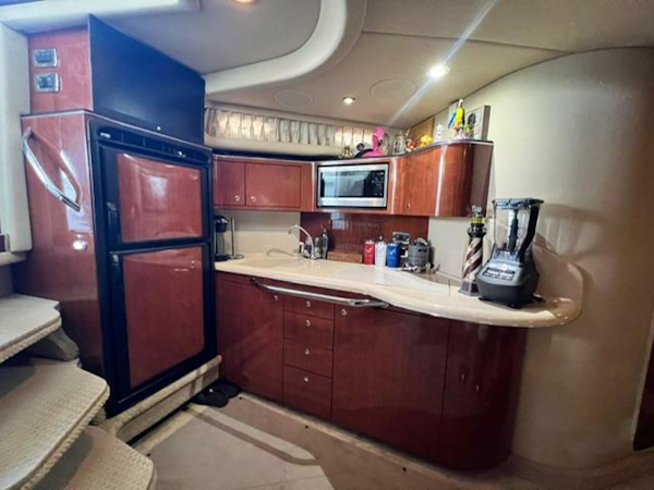 Sea Ray-380 Sundancer 2003 -Stuart-Luxurious kitchen interior of 2003 Sea Ray 380 Sundancer yacht with modern appliances.-5185258
