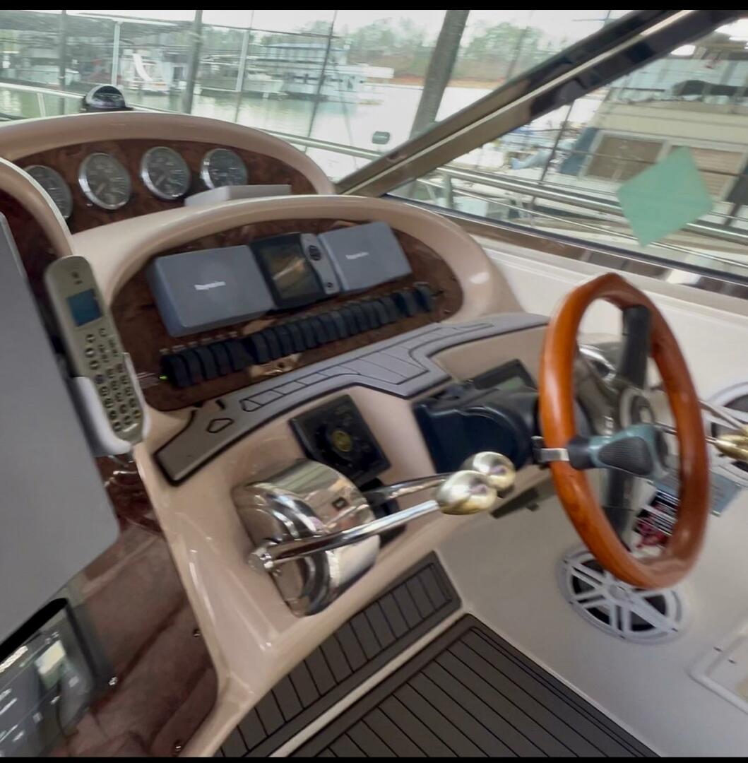 Sea Ray-380 Sundancer 2003 -Stuart-2003 Sea Ray 380 Sundancer helm with wood accents and modern controls.-5185238 | Thumbnail