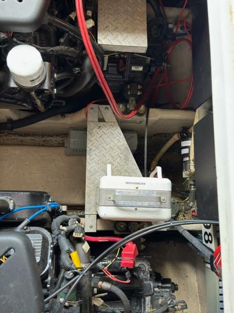 Sea Ray-380 Sundancer 2003 -Stuart-Engine compartment of a 2003 Sea Ray 380 Sundancer with visible wiring and components.-5185265 | Thumbnail