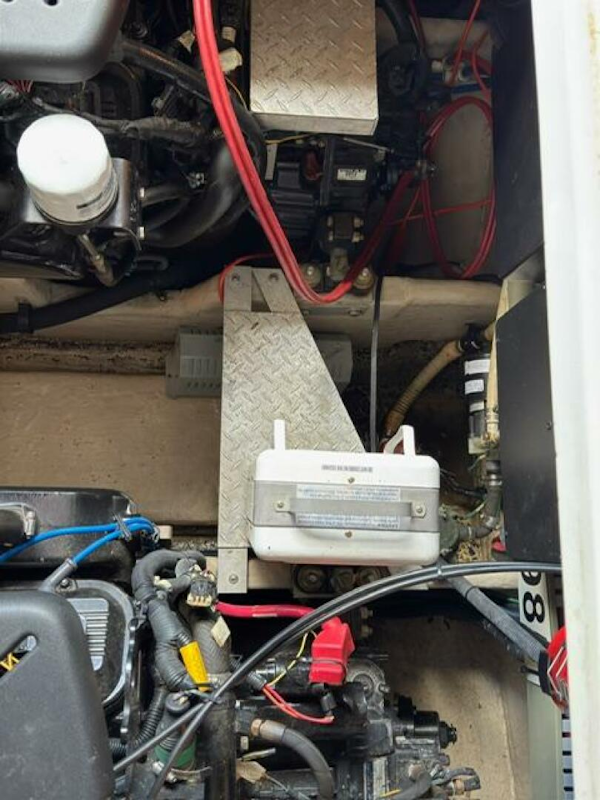 Sea Ray-380 Sundancer 2003 -Stuart-Engine compartment of a 2003 Sea Ray 380 Sundancer with visible wiring and components.-5185265