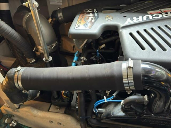 Sea Ray-380 Sundancer 2003 -Stuart-Engine compartment of a 2003 Sea Ray 380 Sundancer boat, featuring Mercury components.-5185264