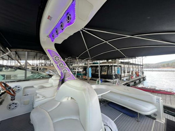 Sea Ray-380 Sundancer 2003 -Stuart-2003 Sea Ray 380 Sundancer yacht interior with seating and canopy at marina.-5185256