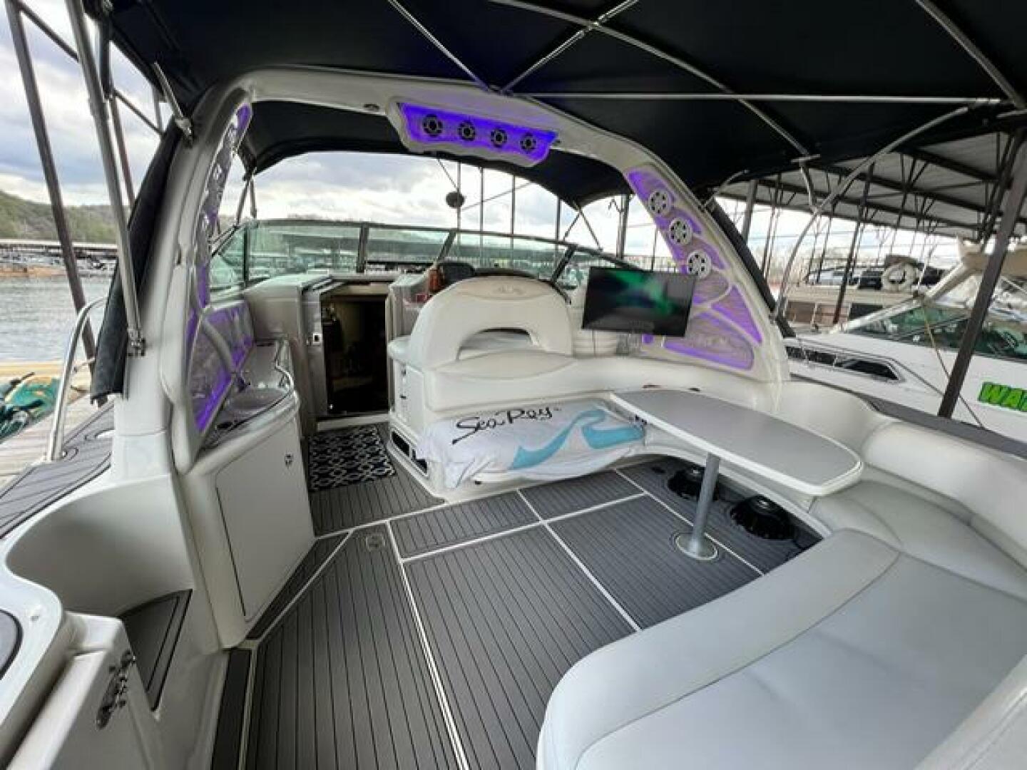 Sea Ray-380 Sundancer 2003 -Stuart-2003 Sea Ray 380 Sundancer interior with seating, table, and ambient lighting.-5185250 | Thumbnail