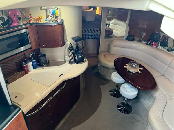 Sea Ray-380 Sundancer 2003 -Stuart-Interior of 2003 Sea Ray 380 Sundancer yacht with kitchen and seating area.-5185261
