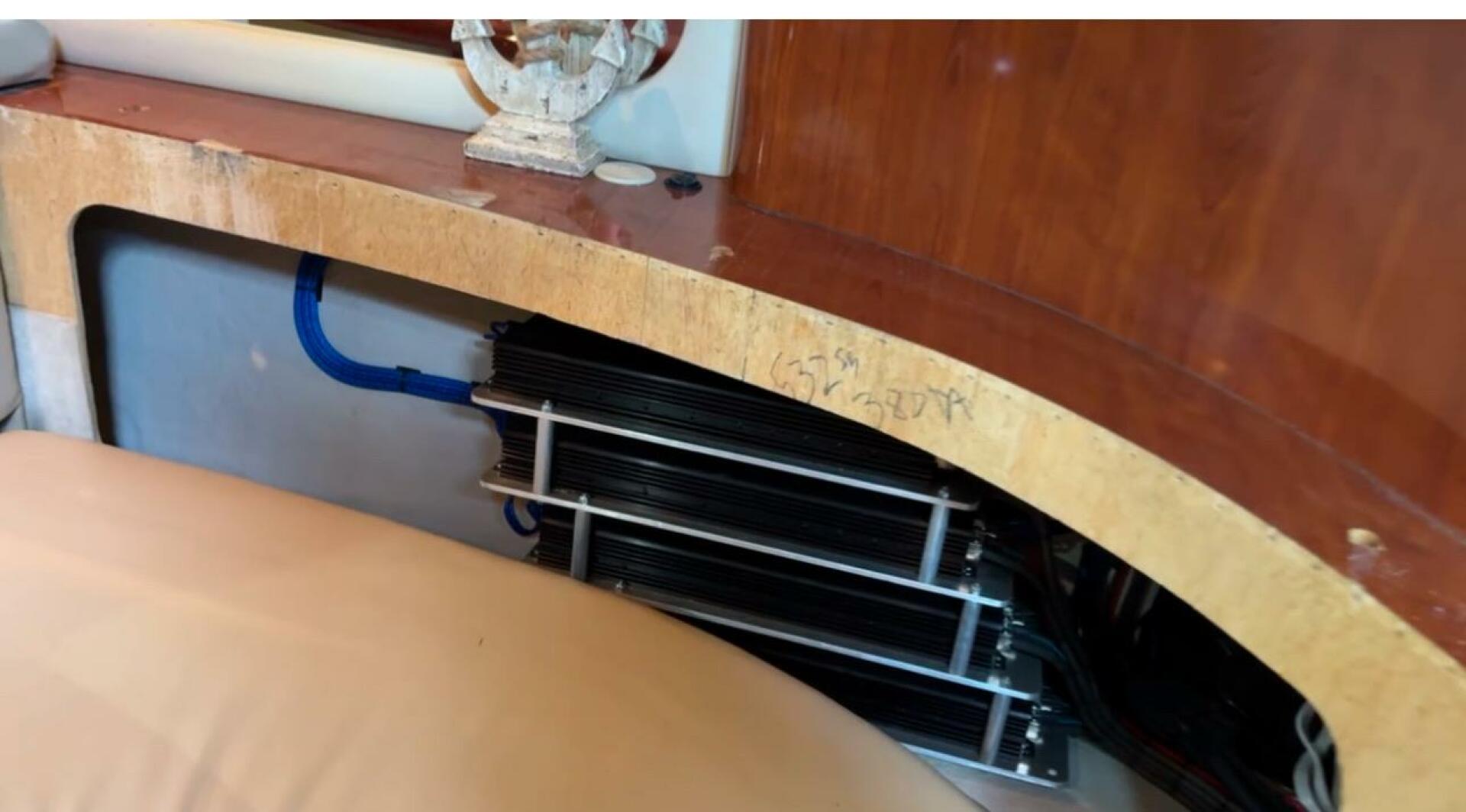 Sea Ray-380 Sundancer 2003 -Stuart-2003 Sea Ray 380 Sundancer interior detail with visible equipment and wood finish.-5185239 | Thumbnail