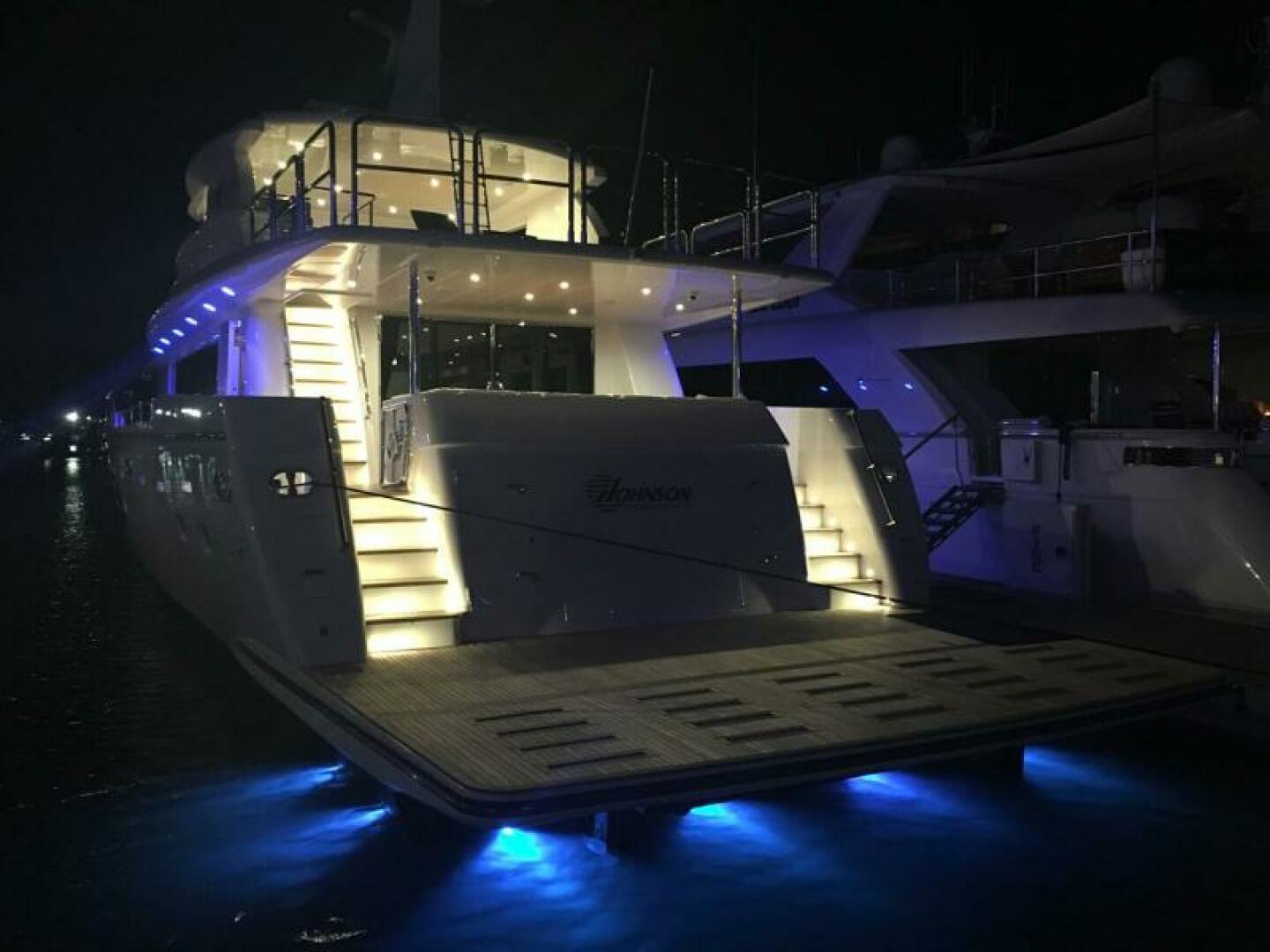 Johnson-Flybridge w/Hydraulic Platform 2027-JOHNSON 93 OPEN FB Kaohsiung-Taiwan-Stern At Night-5032705 | Thumbnail