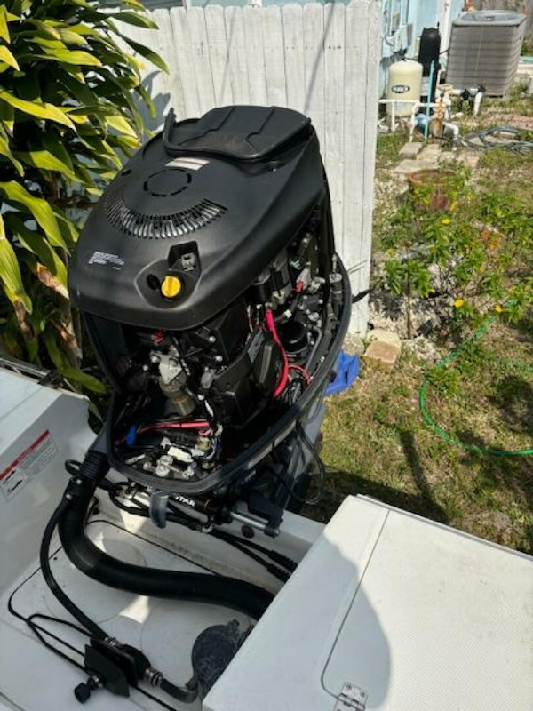Release-208 RX 2016 -Stuart-2016 Release 208 RX boat engine, open cover, outdoor setting.-5114932