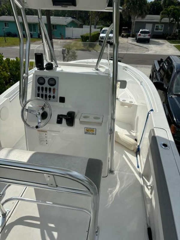 Release-208 RX 2016 -Stuart-2016 Release 208 RX boat with console and seating, parked in a residential area.-5114920