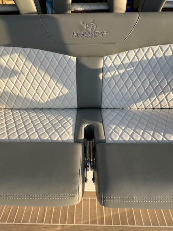 Regulator-41 2024-Fractional Ownership Available Stuart-2024 Regulator 41 boat seat with diamond-stitched upholstery and integrated cup holder.-5234034