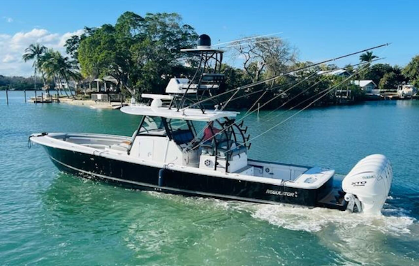 Regulator-41 2024-Fractional Ownership Available Stuart-2024 Regulator 41 boat cruising in a scenic tropical waterway.-5234028