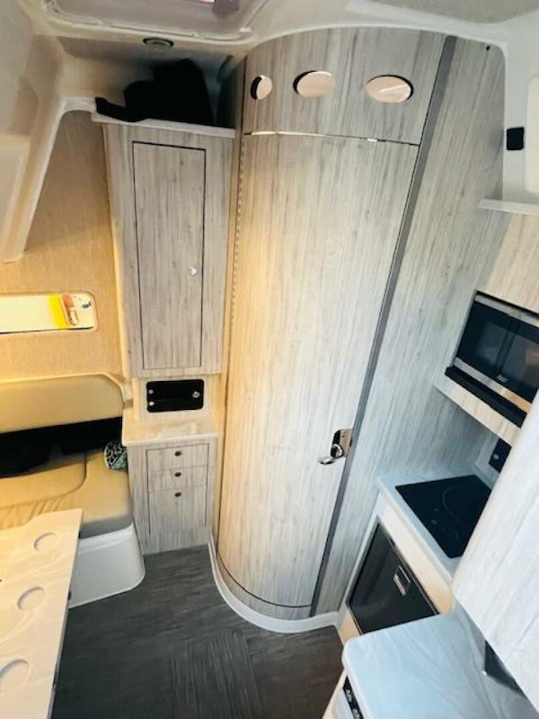 Regulator-41 2024-Fractional Ownership Available Stuart-2024 Regulator 41 interior with modern kitchen and sleek cabinetry design.-5234045