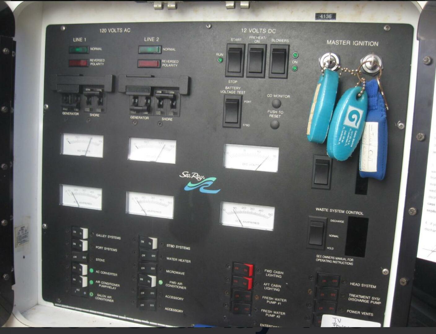 Sea Ray-440 Sundancer 1993 -Stuart-Control panel of a 1993 Sea Ray 440 Sundancer boat with ignition keys.-5268581 | Thumbnail