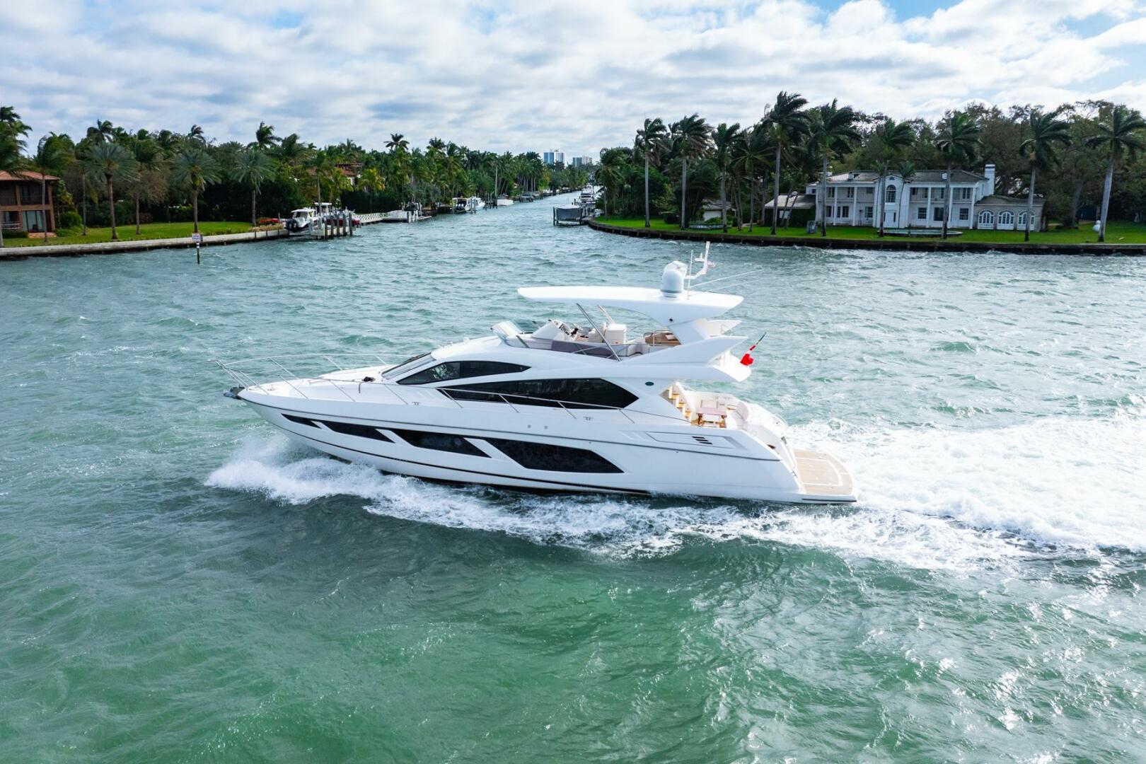 Sunseeker-Manhattan 65 2016 -Stuart-Sunseeker Manhattan 65 yacht cruising on a scenic waterway, 2016 model.-5314519 | Thumbnail