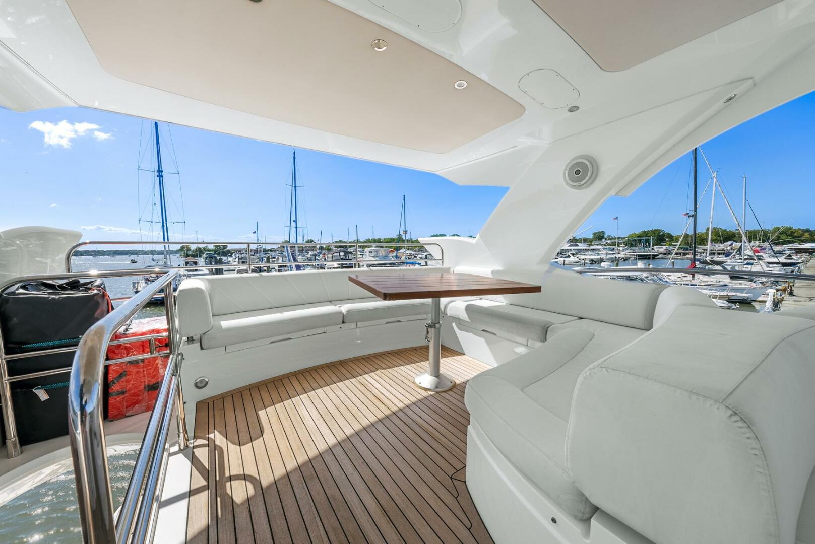 Sunseeker-Manhattan 65 2016 -Stuart-Luxurious 2016 Sunseeker Manhattan 65 yacht with spacious deck and marina view.-5314547 | Thumbnail
