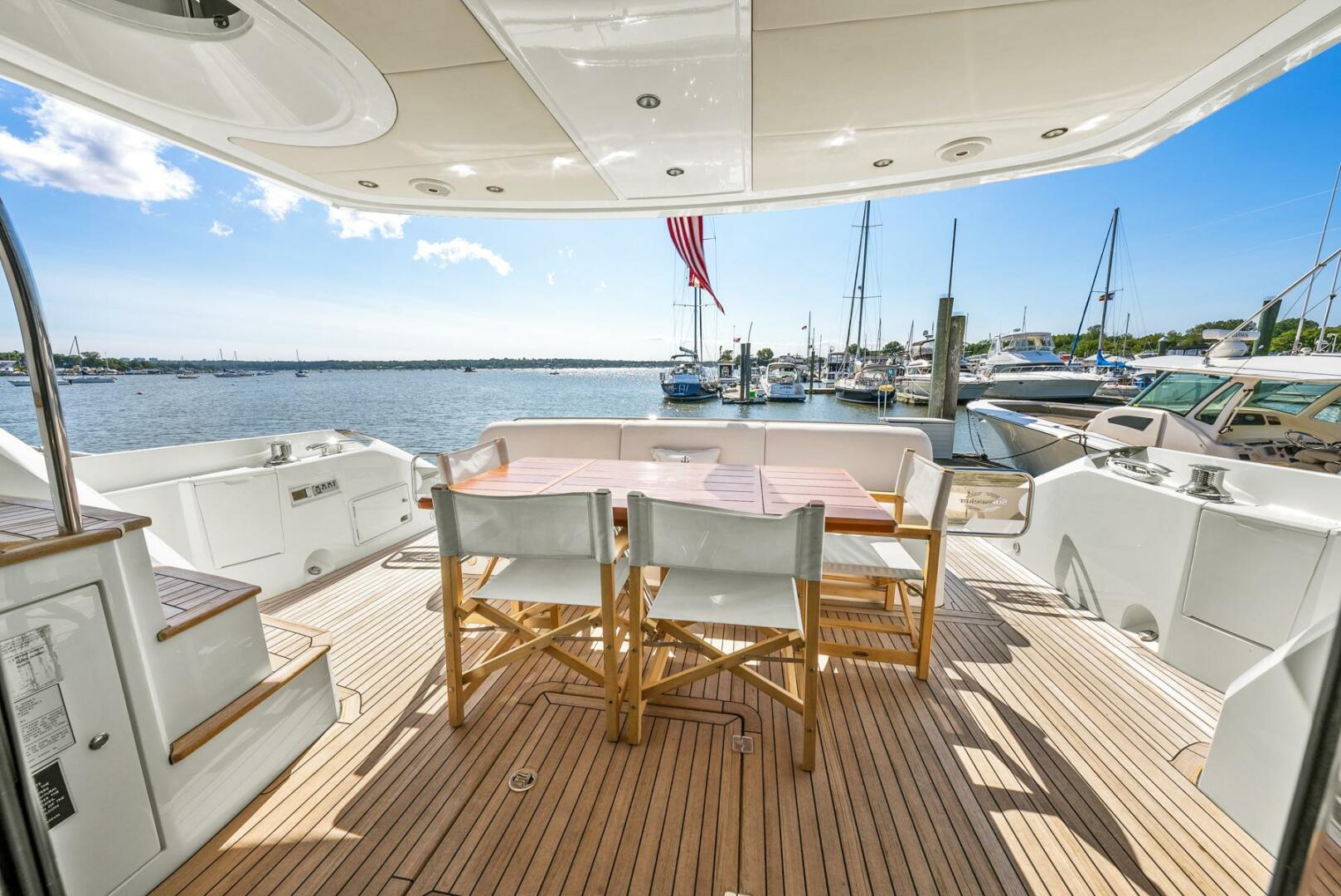 Sunseeker-Manhattan 65 2016 -Stuart-Sunseeker Manhattan 65 yacht deck with seating, overlooking marina, 2016 model.-5314561 | Thumbnail