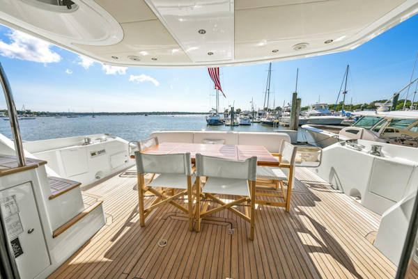 Sunseeker-Manhattan 65 2016 -Stuart-Sunseeker Manhattan 65 yacht deck with seating, overlooking marina, 2016 model.-5314561