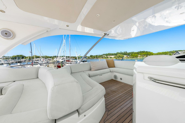 Sunseeker-Manhattan 65 2016 -Stuart-Luxurious 2016 Sunseeker Manhattan 65 yacht interior with white seating and wooden deck.-5314551