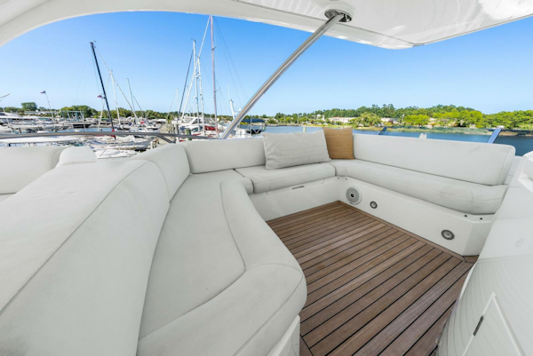 Sunseeker-Manhattan 65 2016 -Stuart-Luxurious seating area on 2016 Sunseeker Manhattan 65 yacht, docked at marina.-5314552