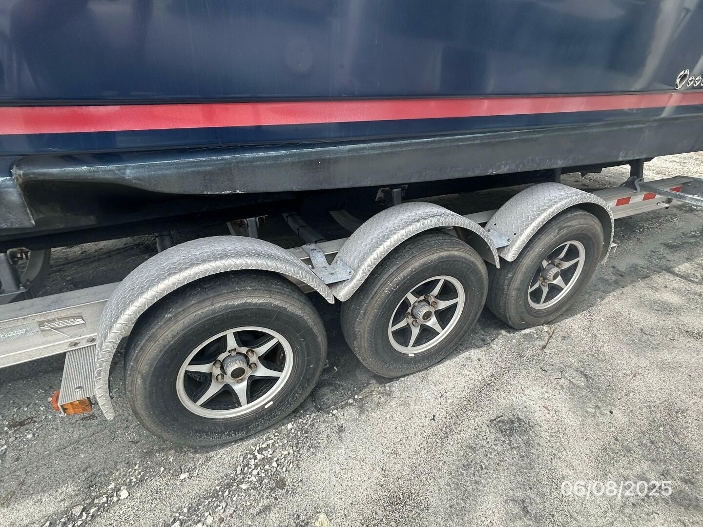 Cutwater-C28 2012-Perseverance Yorktown-Virginia-United States-28 Cutwater trailer left wheels-5408706 | Thumbnail