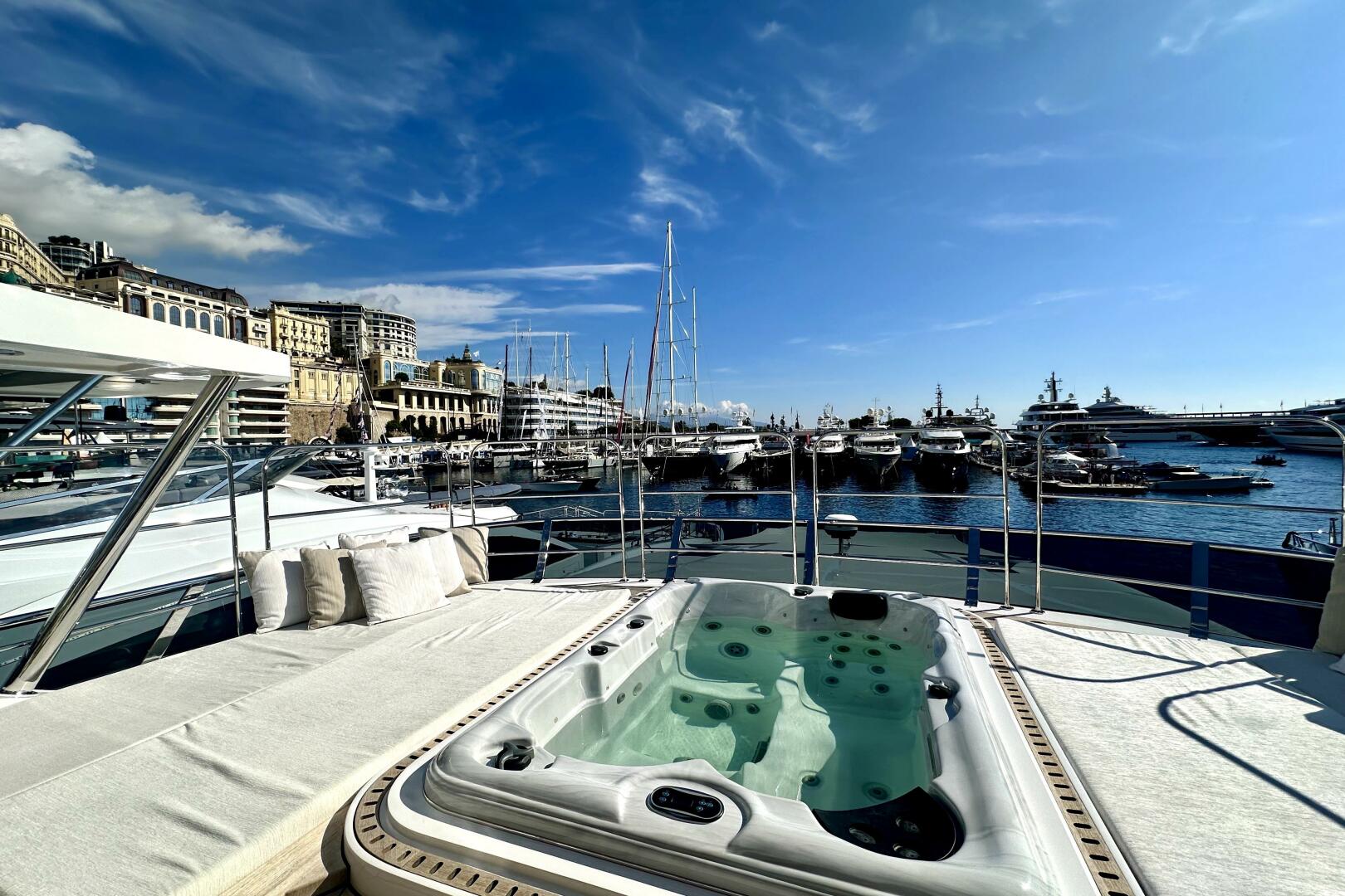 Majesty Yachts-120 2024-Optimism Stuart-Florida-United States-Luxurious 2023 Majesty 120 yacht with jacuzzi, docked in a scenic marina.-5695564 | Thumbnail