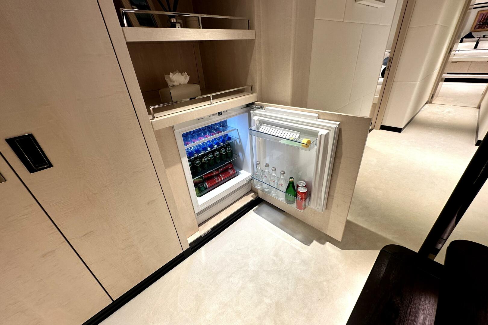 Majesty Yachts-120 2024-Optimism Stuart-Florida-United States-Mini fridge in 2023 Majesty 120 yacht, stocked with beverages, open in luxurious interior.-5695593 | Thumbnail