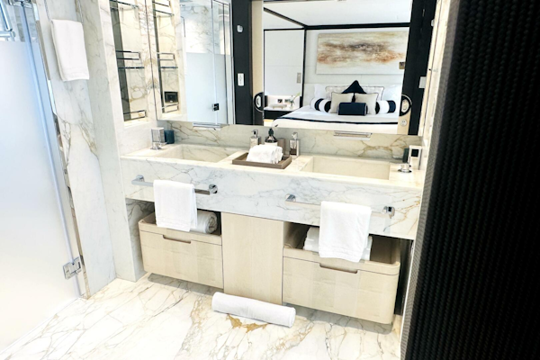 Majesty Yachts-120 2024-Optimism Stuart-Florida-United States-Luxurious marble bathroom in 2023 Majesty 120 yacht, featuring dual sinks and elegant decor.-5695598