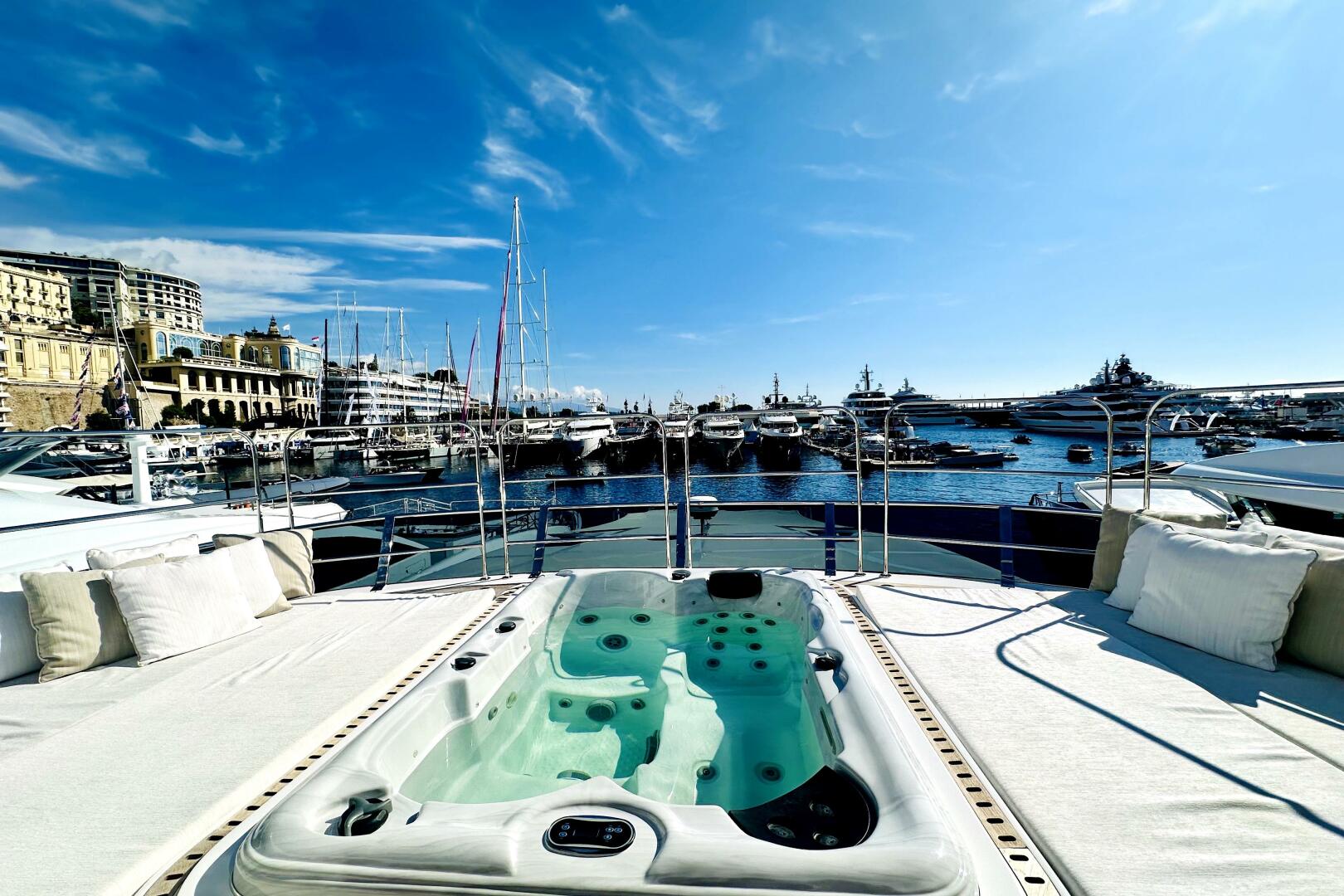Majesty Yachts-120 2024-Optimism Stuart-Florida-United States-Luxurious 2023 Majesty 120 yacht with jacuzzi, docked in a scenic marina under a clear blue sky.-5695563 | Thumbnail