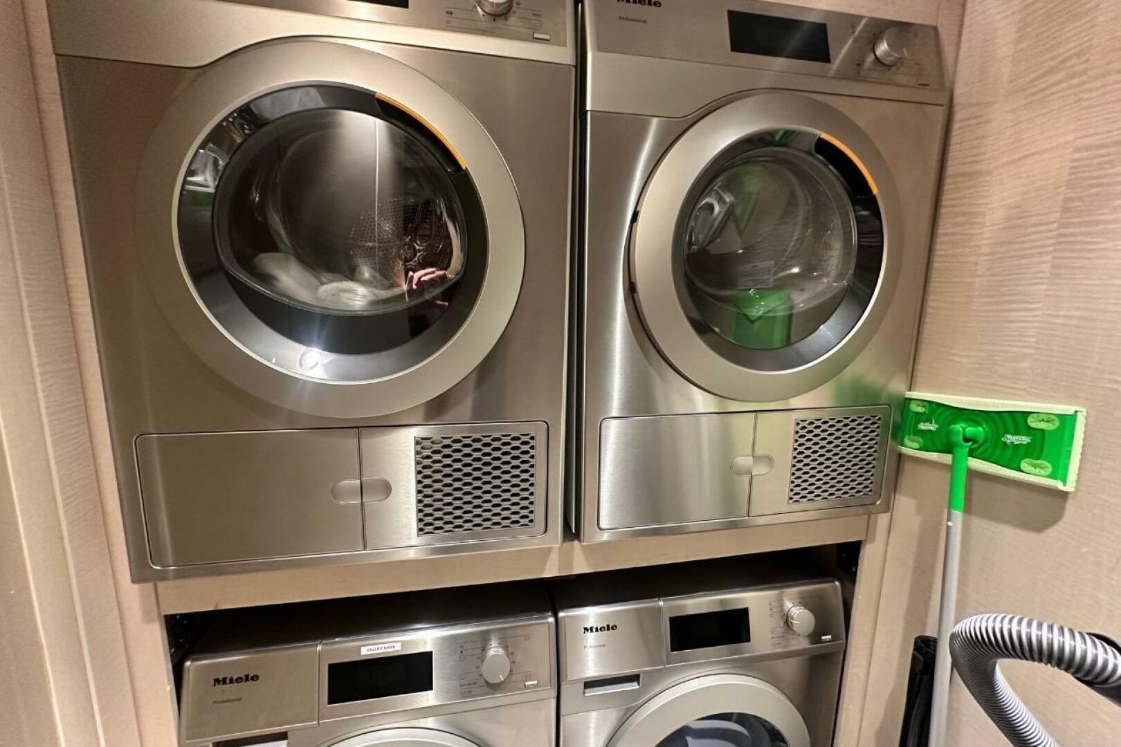 Majesty Yachts-120 2024-Optimism Stuart-Florida-United States-Stacked Miele laundry machines in a compact space, featuring a 2024 Majesty 120 model.-5703021 | Thumbnail