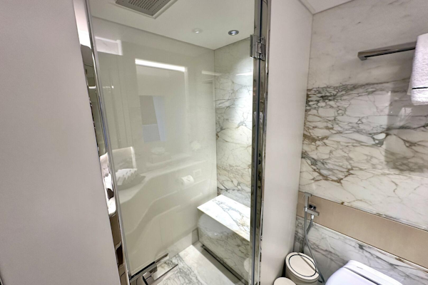Majesty Yachts-120 2024-Optimism Stuart-Florida-United States-Luxurious marble bathroom in 2023 Majesty 120 yacht, featuring modern shower and elegant design.-5695576