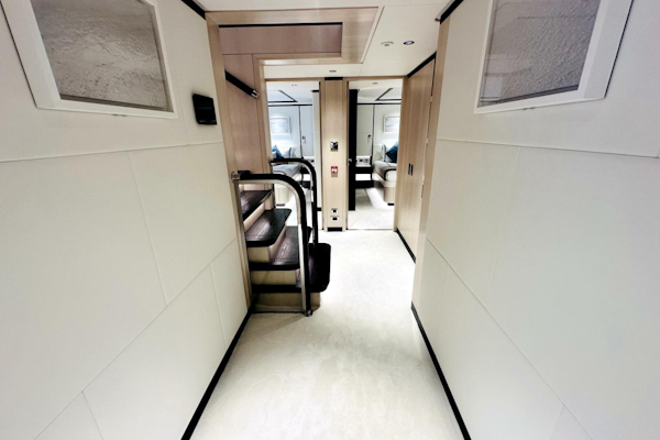 Majesty Yachts-120 2024-Optimism Stuart-Florida-United States-Luxurious interior hallway of 2023 Majesty 120 yacht with modern design and staircase.-5695594