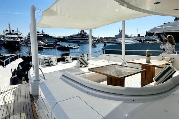 Majesty Yachts-120 2024-Optimism Stuart-Florida-United States-Luxurious 2023 Majesty 120 yacht deck with elegant seating, overlooking marina filled with yachts.-5695562