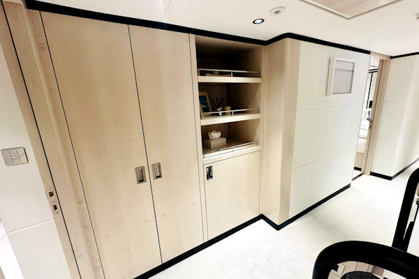 Majesty Yachts-120 2024-Optimism Stuart-Florida-United States-Modern interior of 2023 Majesty 120 yacht with sleek wooden cabinetry and open shelving.-5695590