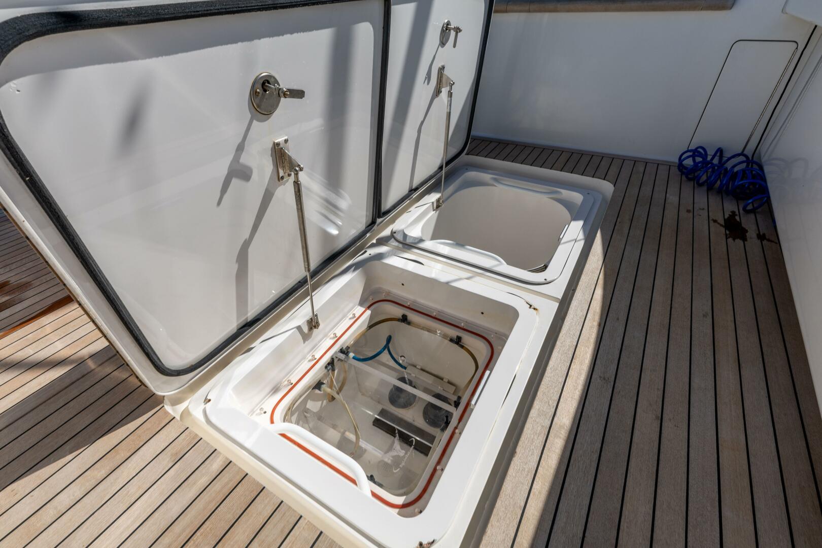 Viking-76 Convertible 2013-Reel Fire Orange Beach-Alabama-United States-2013 Viking 76 Convertible REEL FIRE Cockpit Storage-5783590 | Thumbnail