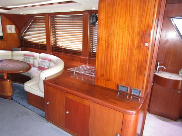 Striker-62 Convertible 1989-ELSKA  Boca Raton-Florida-United States-Salon To Starboard With Electrical Panel-5830695