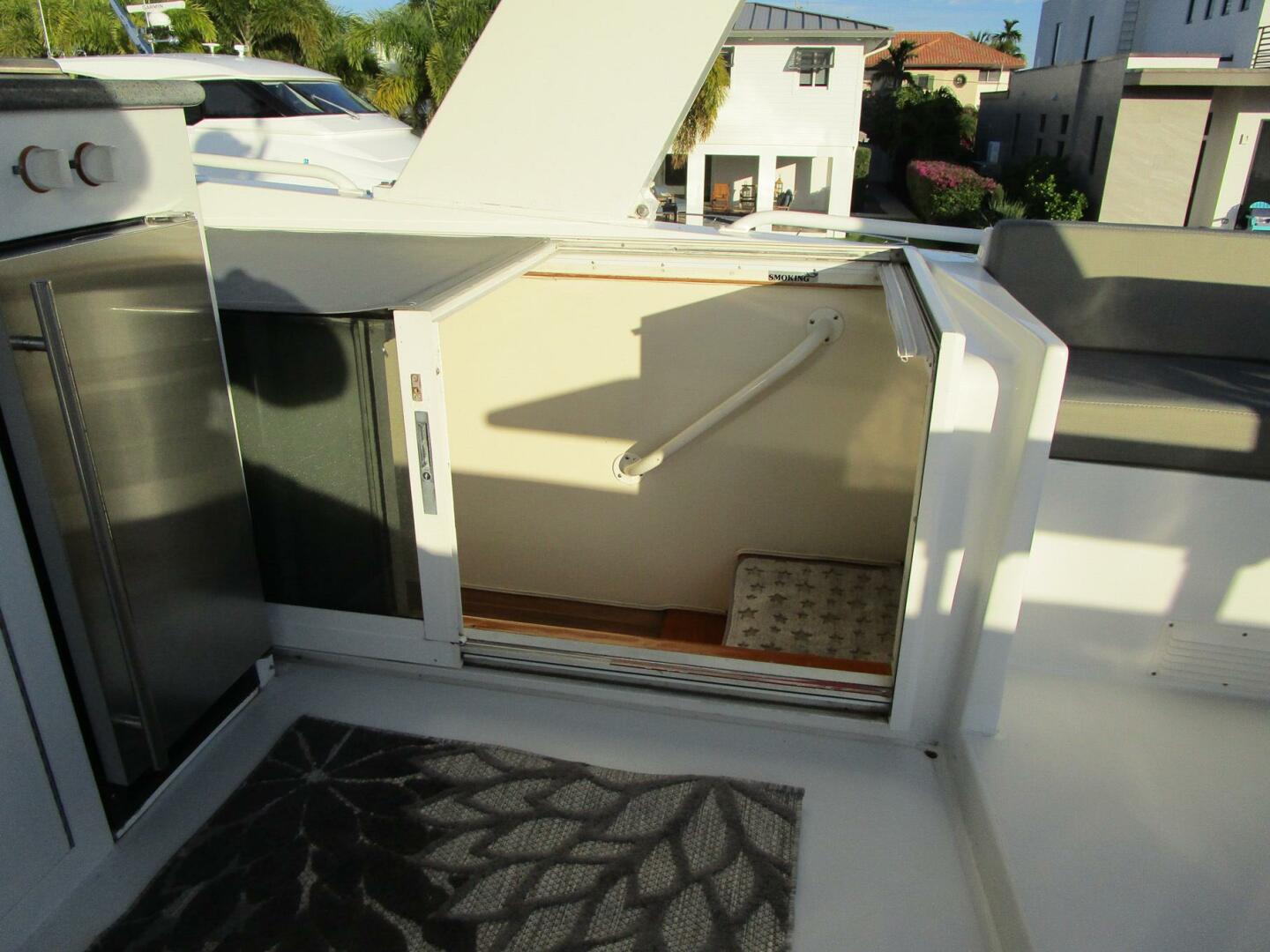 Viking-Cockpit Motor Yacht 1990-LUCKY STARS  Fort Lauderdale-Florida-United States-Flybridge Entry Steps-5864569 | Thumbnail